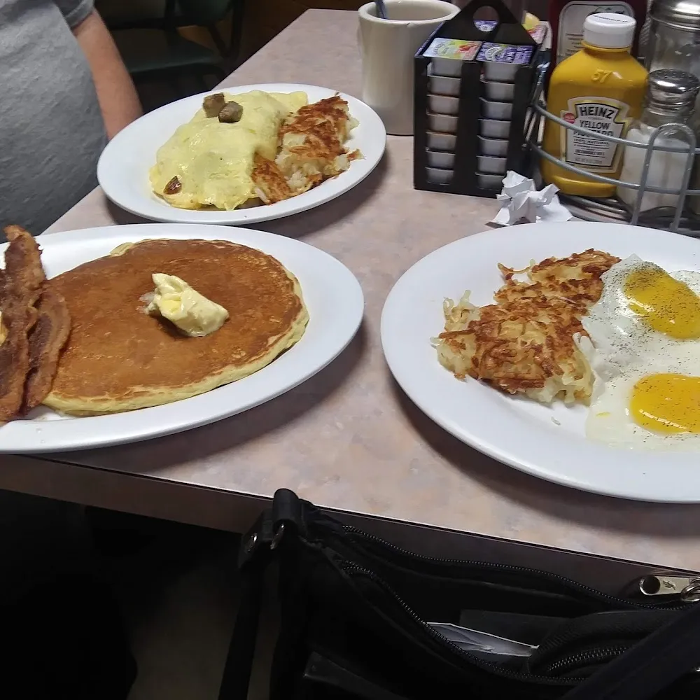 2 Eggs with Hash Browns and Toast Omelet Special Ordet and Pancakes